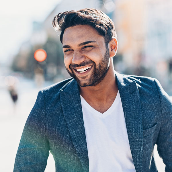 Smiling young man after general dental treatment in Fenton, MO