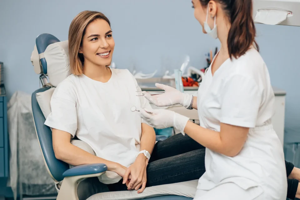 Dentist attending to a patient during a general dentistry appointment in Fenton, MO