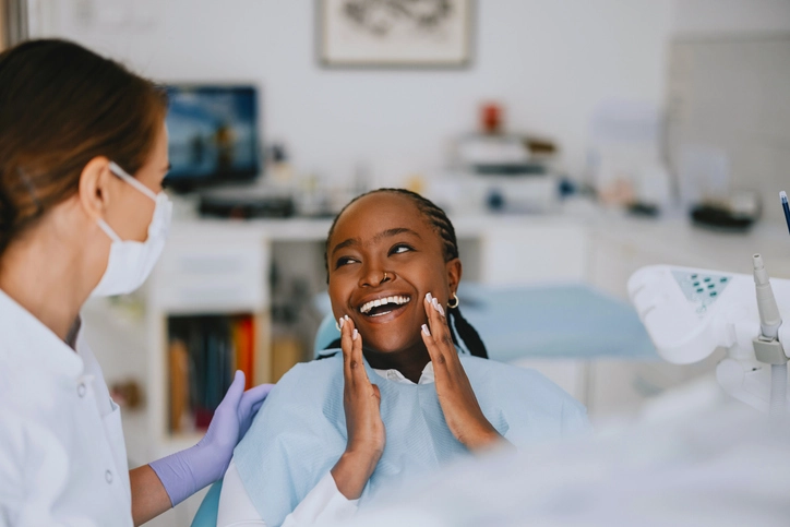 A Patient Interacting with a Dental Professional During a Teeth Cleaning Appointment in Fenton, MO